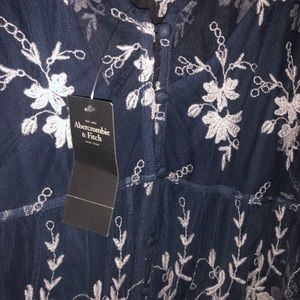 Navy blue short sleeved laced t-shirt